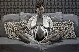 A woman sits on a gray couch cross legged in a white robe, tied loosely above her partially exposed pregnant belly. Her facial expression is tired yet regal, with a thin halo circled around her head. The wall behind her is patterned with black Ankh Charms, her skin is formed with linear carving, while the couch and pillows are formed from brushy paint.