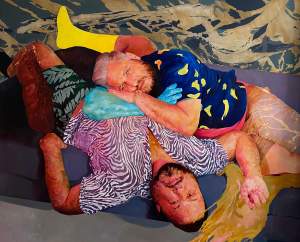 Two men lay on a patterned surface, embracing each other. One wears a blue shirt with bananas and shorts, the other a zebra print shirt and green shorts. Background features abstract patterns.
