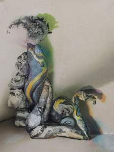 Faer Child is a painting with a distorted form at the center, evoking body parts and stones twisted together.