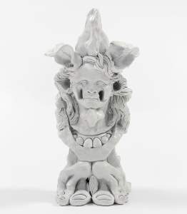 Untitled (Bust 9) is a white surreal figurative bust, with a face at the upper center, flanked by large animal ears. Below it is another jaw with large rounded teeth, and hands that frame oversized toes.
