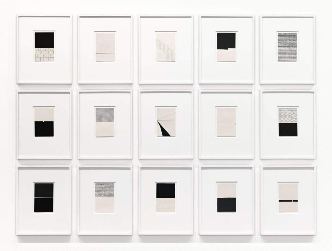 Landscapes & Atmospheres is a grd of fifteen framed mixed media drawings presented in a tight grid. Each artwork has elements of black geometric shapes and pencil drawn grids.