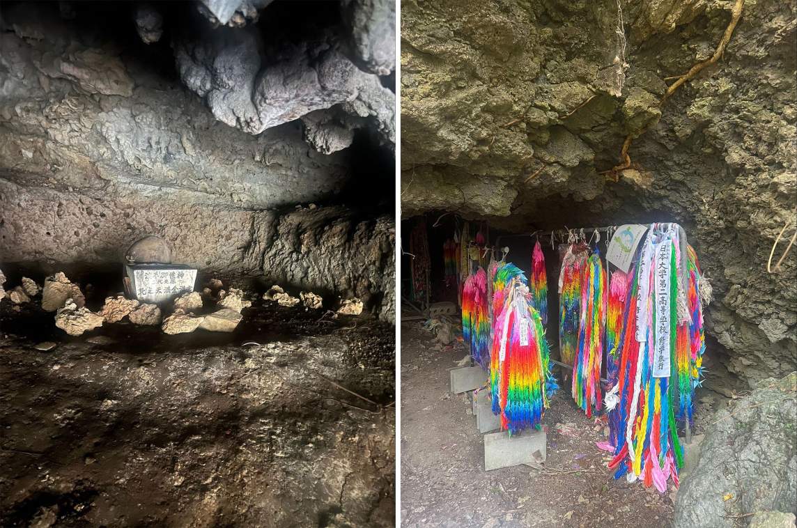 On left, in a limestone cave, an assortment of rocks encircle a marker with Japanese characters. On right, thousands of paper cranes are strung together in rainbow colors, and hang in bundles at cave entrance.