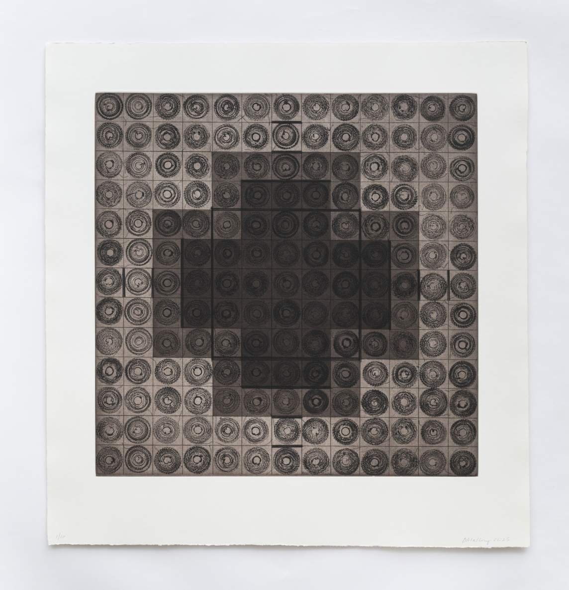 A print is made up of a grid of thirteen rows by thirteen columns of squares. Each square contains a set of concentric rings, which appear textured like thread or tread marks. Darker-toned prints at the center make a plus-sign, which is echoed by a slightly lighter band around it.