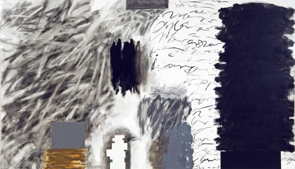 Black Tower is a horizontally-oriented painting with an energetic, abstract composition. On the far right is a black tower, formed from heavy black paint strokes, flanked to the left by illegible text-like scribbles. On the far left is a cloud of smudged and staccato gestures in black and white. Other abstract forms interrupt the canvas in the center: a solid gray rectangle with ochre strokes below, vertical harsh black strokes, and a smudgy cloud of gray.
