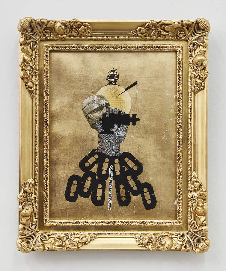 Undiscovered Genius of the Americas (Inter Caetera), is a collage work in an ornate gold frame. A geometrically patterned bust has puzzle pieces obscuring eyes, and another image of a stone head emerges from the back of the head. Above the bust extends a globe, topped with a tall sail ship.